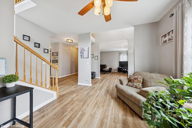 142 W Park Ave Unit C, Sugar Grove, IL 60554 - living area with wood finished floors, ceiling fan, and stairs