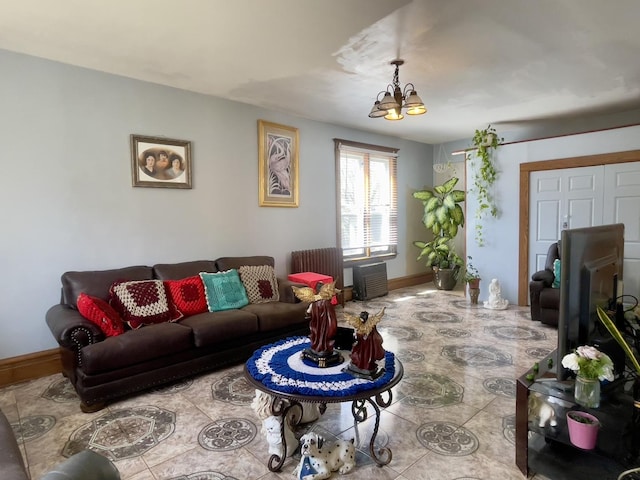 2632 S Austin Blvd, Cicero, IL 60804 - living room featuring radiator and a chandelier