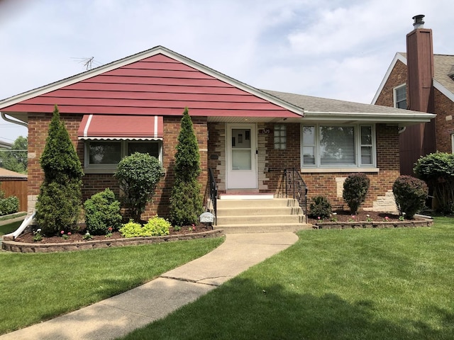 1525 Morgan Ave, La Grange Park, IL 60526 - view of front of house featuring a front lawn and brick siding