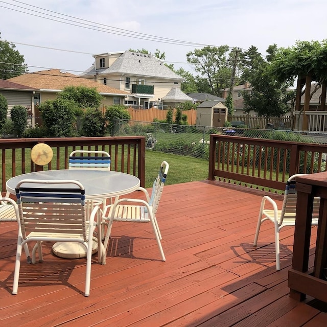 1525 Morgan Ave, La Grange Park, IL 60526 - wooden terrace with a fenced backyard, a storage shed, and outdoor dining area