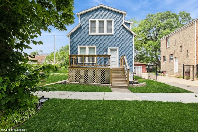 11616 S Lowe Ave, Chicago, IL 60628 - view of front of house with a front lawn and a deck
