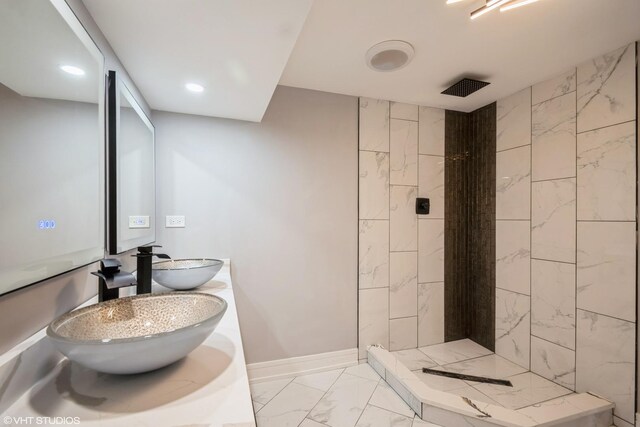 11616 S Lowe Ave, Chicago, IL 60628 - full bathroom with marble finish floors, tiled shower, double vanity, and recessed lighting