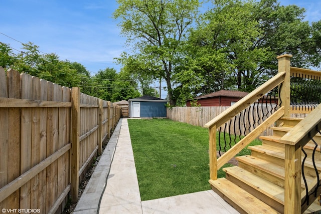 11616 S Lowe Ave, Chicago, IL 60628 - fenced backyard featuring stairs and a storage shed