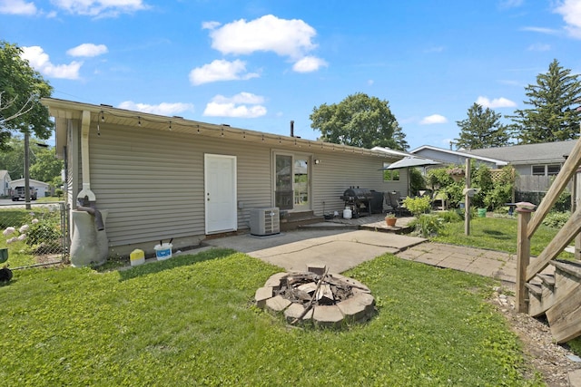 277 Mcmillan St, Grayslake, IL 60030 - rear view of property with an outdoor fire pit and a patio area