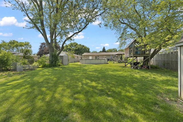 277 Mcmillan St, Grayslake, IL 60030 - fenced backyard with a shed