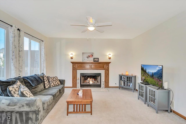 1612 Whisper Glen Dr, Plainfield, IL 60586 - living area featuring light carpet, a ceiling fan, and a tile fireplace