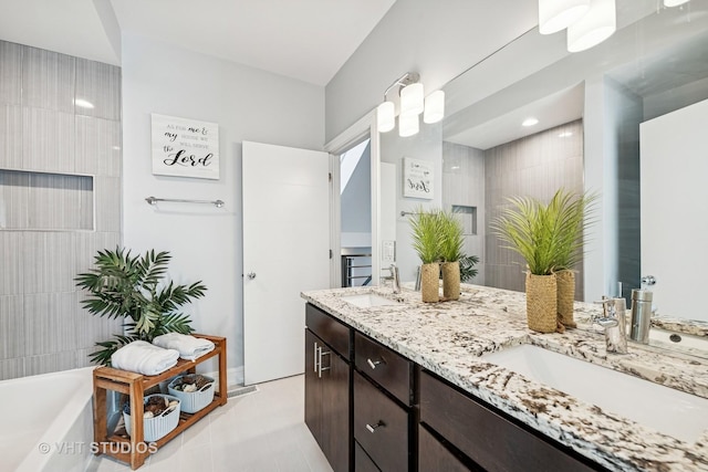 2503 N Maplewood Ave, Chicago, IL 60647 - bathroom featuring double vanity and a bath