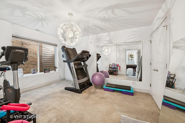 2503 N Maplewood Ave, Chicago, IL 60647 - workout area with carpet and a chandelier