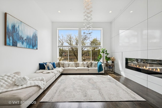 2503 N Maplewood Ave, Chicago, IL 60647 - living room with wood finished floors, recessed lighting, and a glass covered fireplace