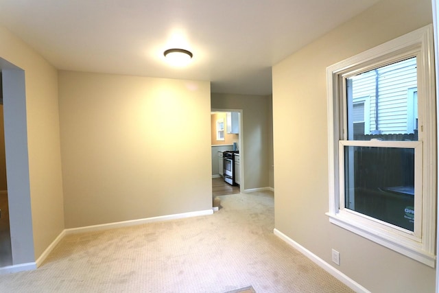 123 E Pineview Dr, Round Lake Park, IL 60073 - carpeted spare room featuring baseboards
