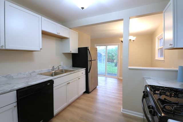 123 E Pineview Dr, Round Lake Park, IL 60073 - kitchen featuring black appliances, white cabinetry, light wood finished floors, and light stone counters