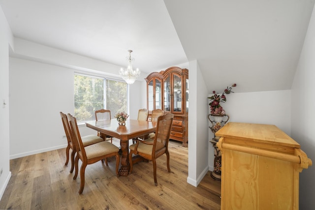 1678 Penny Ln, Bartlett, IL 60103 - dining room featuring a chandelier and light wood-style floors