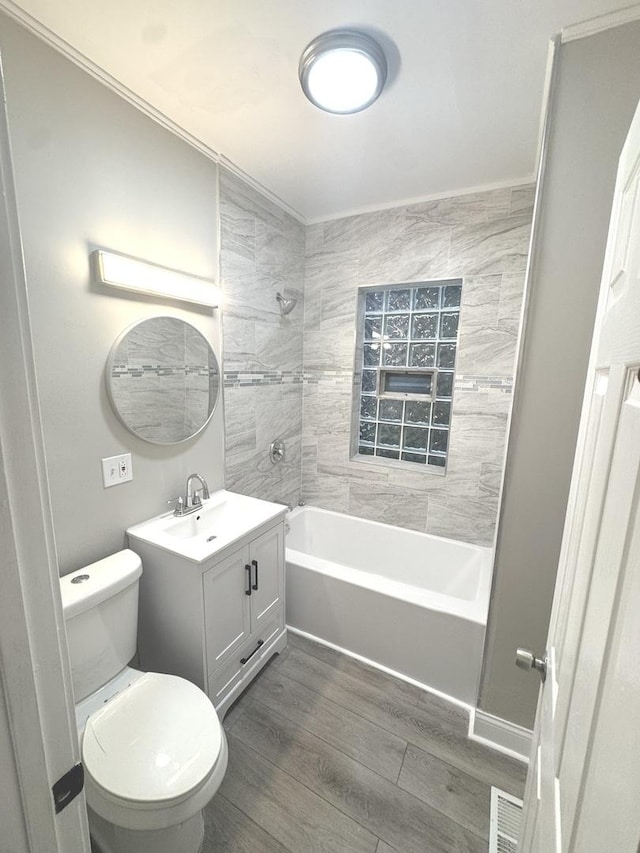 9432 S Vernon Ave, Chicago, IL 60619 - full bathroom featuring vanity, bathtub / shower combination, and wood finished floors