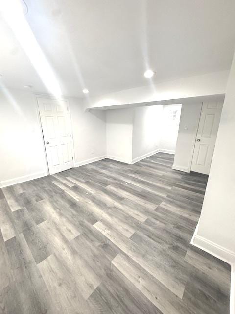9432 S Vernon Ave, Chicago, IL 60619 - finished below grade area featuring dark wood-style floors and recessed lighting