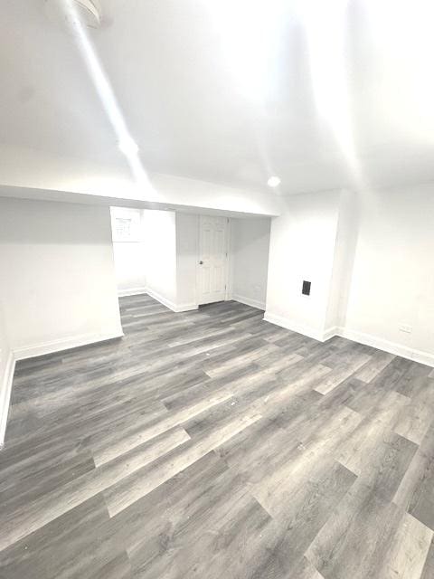9432 S Vernon Ave, Chicago, IL 60619 - bonus room featuring dark wood finished floors and baseboards