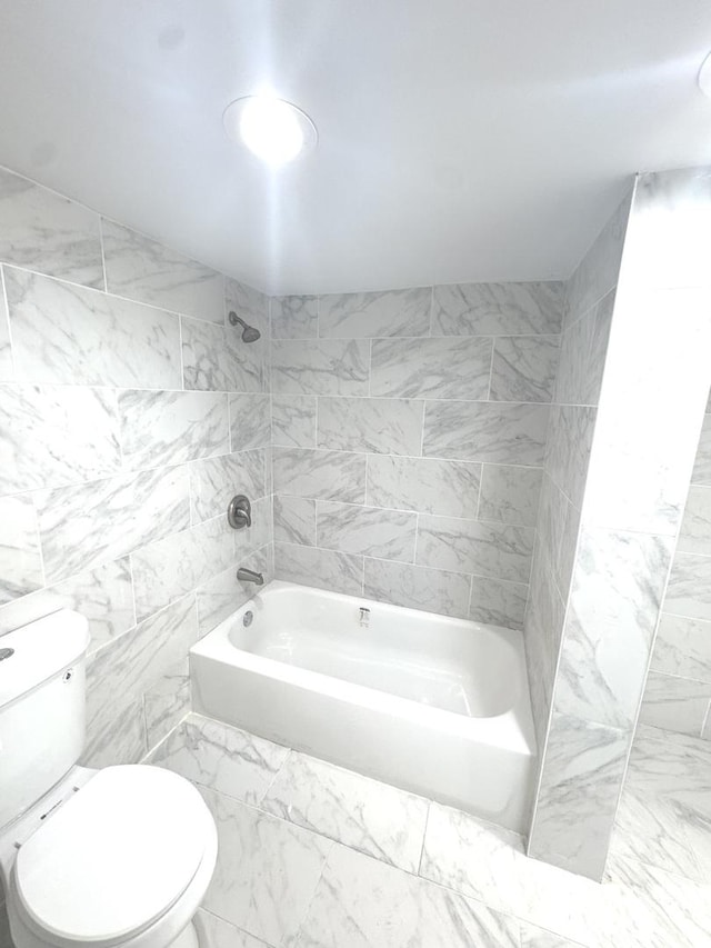 9432 S Vernon Ave, Chicago, IL 60619 - full bathroom featuring shower / tub combination and marble look tiles