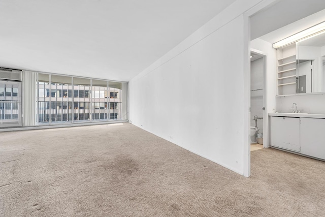 300 N State St Unit 5320, Chicago, IL 60654 - spare room featuring light colored carpet and a wall mounted AC