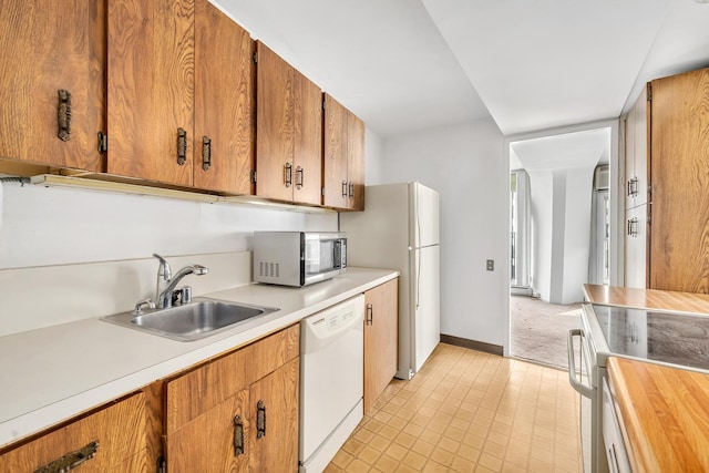 300 N State St Unit 5320, Chicago, IL 60654 - kitchen featuring stainless steel appliances and brown cabinets