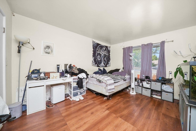 210 Diane Ln, Bolingbrook, IL 60440 - bedroom with wood finished floors and a desk