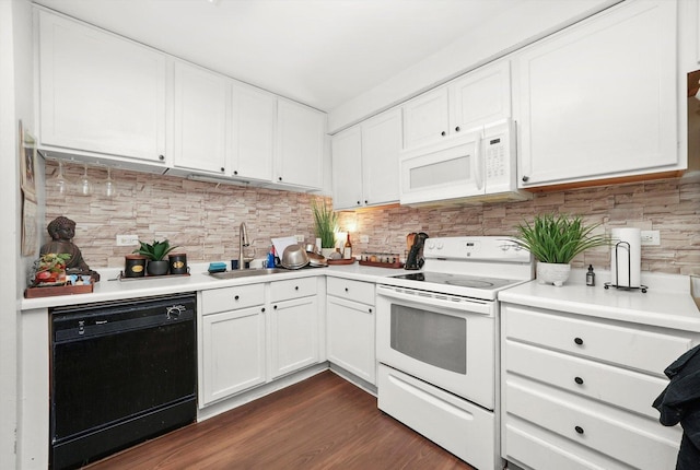 210 Diane Ln, Bolingbrook, IL 60440 - kitchen featuring white appliances, white cabinets, light countertops, and decorative backsplash
