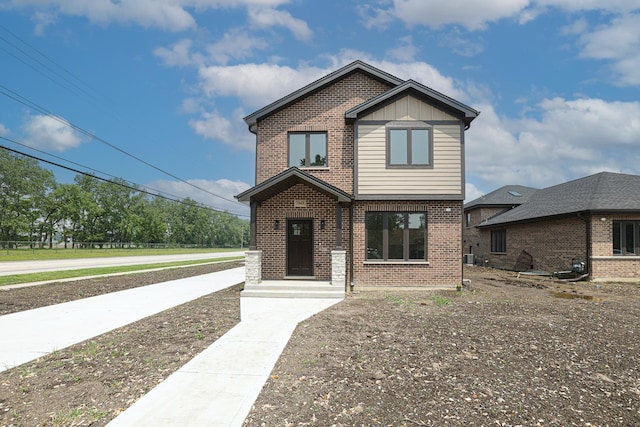 7948 W 74th Ave, Bridgeview, IL 60455 - view of front of house featuring brick siding and board and batten siding