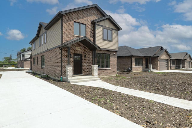 7948 W 74th Ave, Bridgeview, IL 60455 - view of front facade with concrete driveway, brick siding, and a garage
