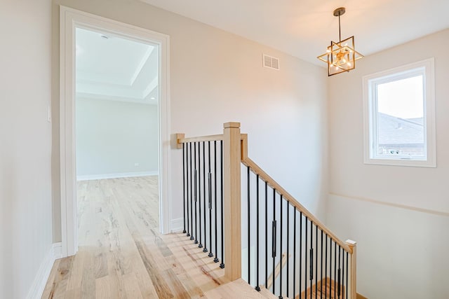 7948 W 74th Ave, Bridgeview, IL 60455 - stairway with wood finished floors and a chandelier