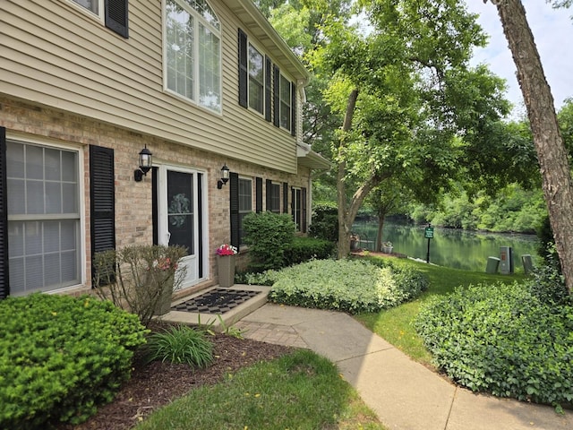 1530 Laurel Oaks Dr, Streamwood, IL 60107 - view of exterior entry featuring a water view