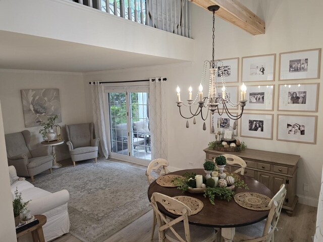 1530 Laurel Oaks Dr, Streamwood, IL 60107 - dining space with a chandelier, wood finished floors, ornamental molding, and a high ceiling