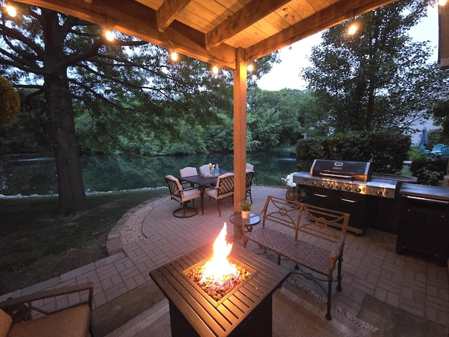 1530 Laurel Oaks Dr, Streamwood, IL 60107 - view of patio with an outdoor fire pit, outdoor dining area, and exterior kitchen