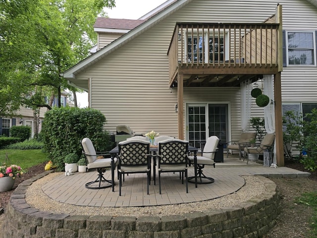 1530 Laurel Oaks Dr, Streamwood, IL 60107 - back of property featuring outdoor dining space, a balcony, and a patio