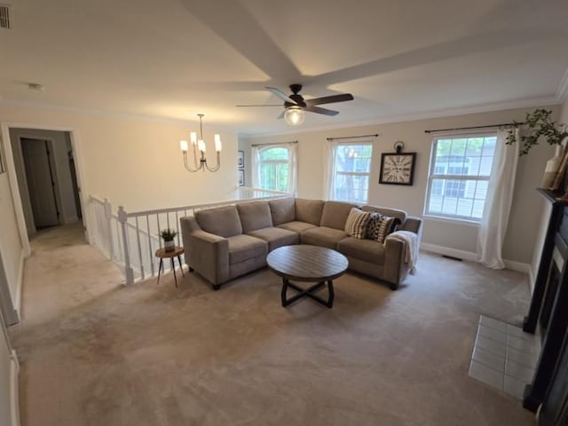1530 Laurel Oaks Dr, Streamwood, IL 60107 - living area featuring healthy amount of natural light, carpet, a chandelier, ceiling fan, and ornamental molding