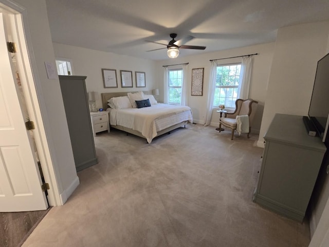 1530 Laurel Oaks Dr, Streamwood, IL 60107 - bedroom with light carpet and a ceiling fan