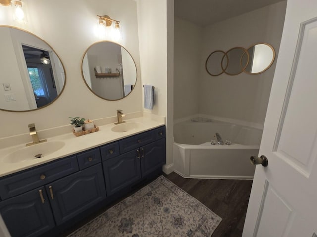 1530 Laurel Oaks Dr, Streamwood, IL 60107 - bathroom featuring wood finished floors, double vanity, and a garden tub