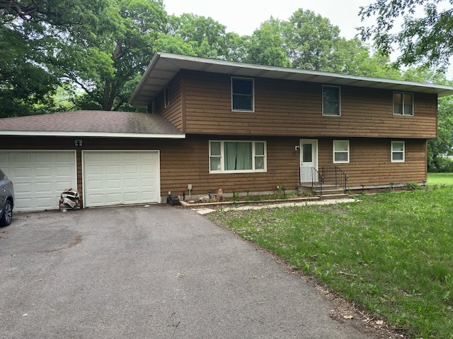 21058 Oak Ln, Maple Park, IL 60151 - view of front of house with a garage, driveway, and a front yard