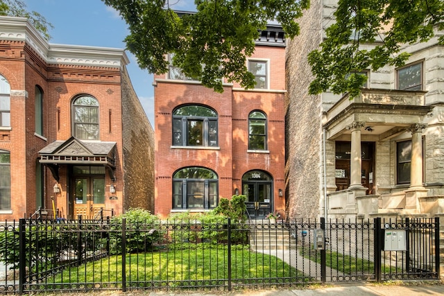 1304 N Hoyne Ave Unit 1, Chicago, IL 60622 - view of front of home featuring brick siding