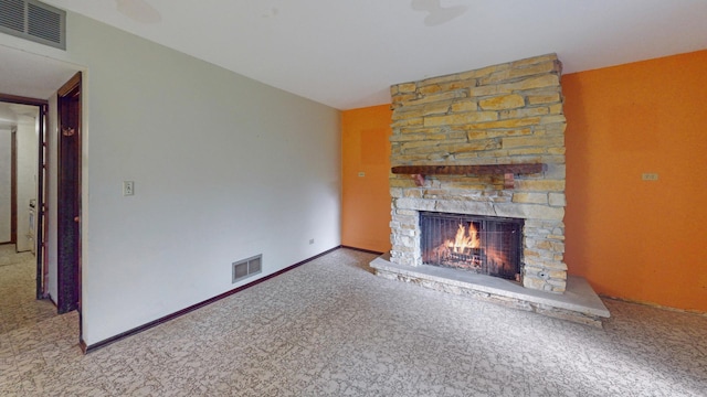198 S Circle Ave, Bloomingdale, IL 60108 - unfurnished living room with a stone fireplace and carpet flooring
