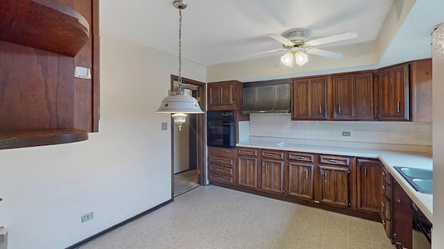 198 S Circle Ave, Bloomingdale, IL 60108 - kitchen featuring black oven, premium range hood, a ceiling fan, tasteful backsplash, and light countertops