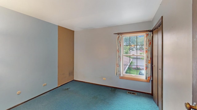 198 S Circle Ave, Bloomingdale, IL 60108 - empty room with carpet floors and baseboards
