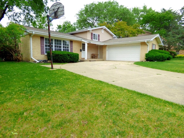1420 E Lake Louise Dr, Palatine, IL 60074 - view of front of house with an attached garage, a front yard, driveway, and brick siding