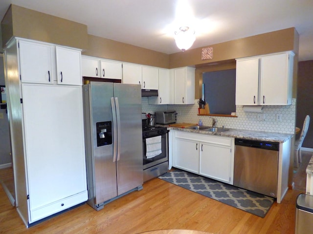 1420 E Lake Louise Dr, Palatine, IL 60074 - kitchen with appliances with stainless steel finishes, light wood finished floors, white cabinetry, and backsplash