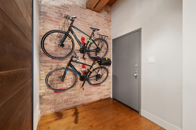 400 S Green St Unit 406, Chicago, IL 60607 - detailed view of wood finished floors and brick wall
