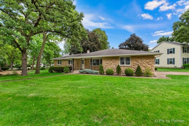 195 Westgate Dr, Elgin, IL 60123 - ranch-style house with a front yard and a chimney