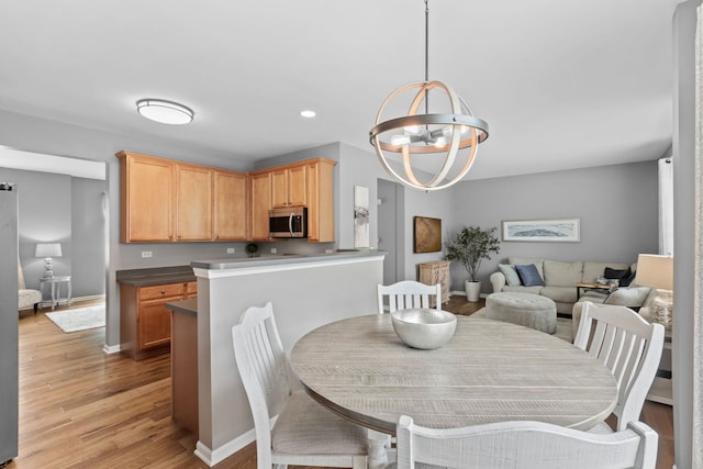 3072 Bridgeham St, Elgin, IL 60124 - dining room featuring a chandelier, light wood-type flooring, and recessed lighting