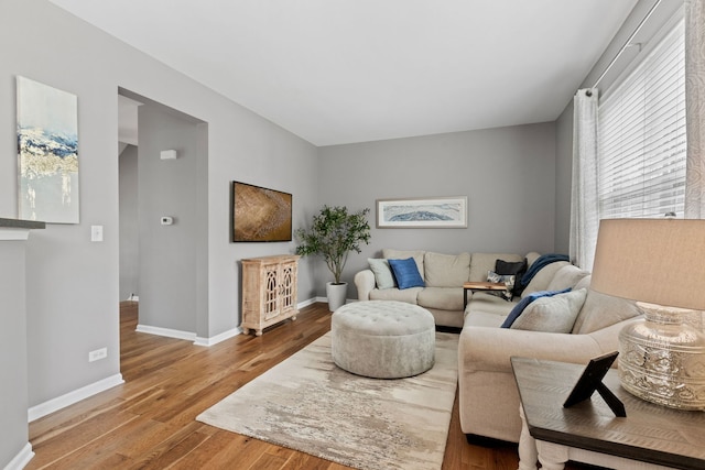 3072 Bridgeham St, Elgin, IL 60124 - living room featuring baseboards and wood finished floors