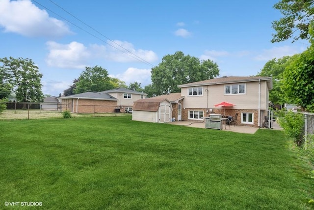 9133 Moody Ave, Oak Lawn, IL 60453 - rear view of property featuring a shed, a patio area, and a fenced backyard