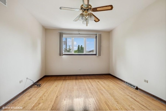 9133 Moody Ave, Oak Lawn, IL 60453 - unfurnished room featuring light wood-type flooring and a ceiling fan