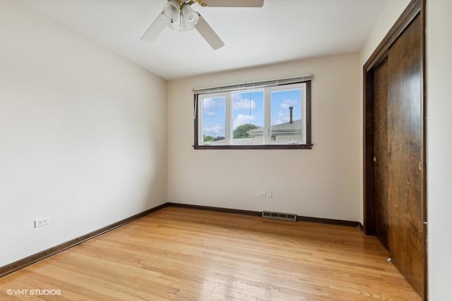 9133 Moody Ave, Oak Lawn, IL 60453 - unfurnished bedroom with light wood-style flooring, a closet, and a ceiling fan