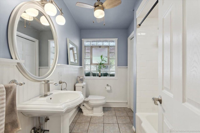 9122 S Avers Ave, Evergreen Park, IL 60805 - full bathroom with a wainscoted wall, tile patterned flooring, ceiling fan, and shower / tub combination