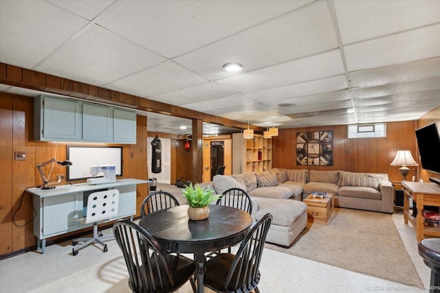 9122 S Avers Ave, Evergreen Park, IL 60805 - dining space with wood walls, a paneled ceiling, and light floors